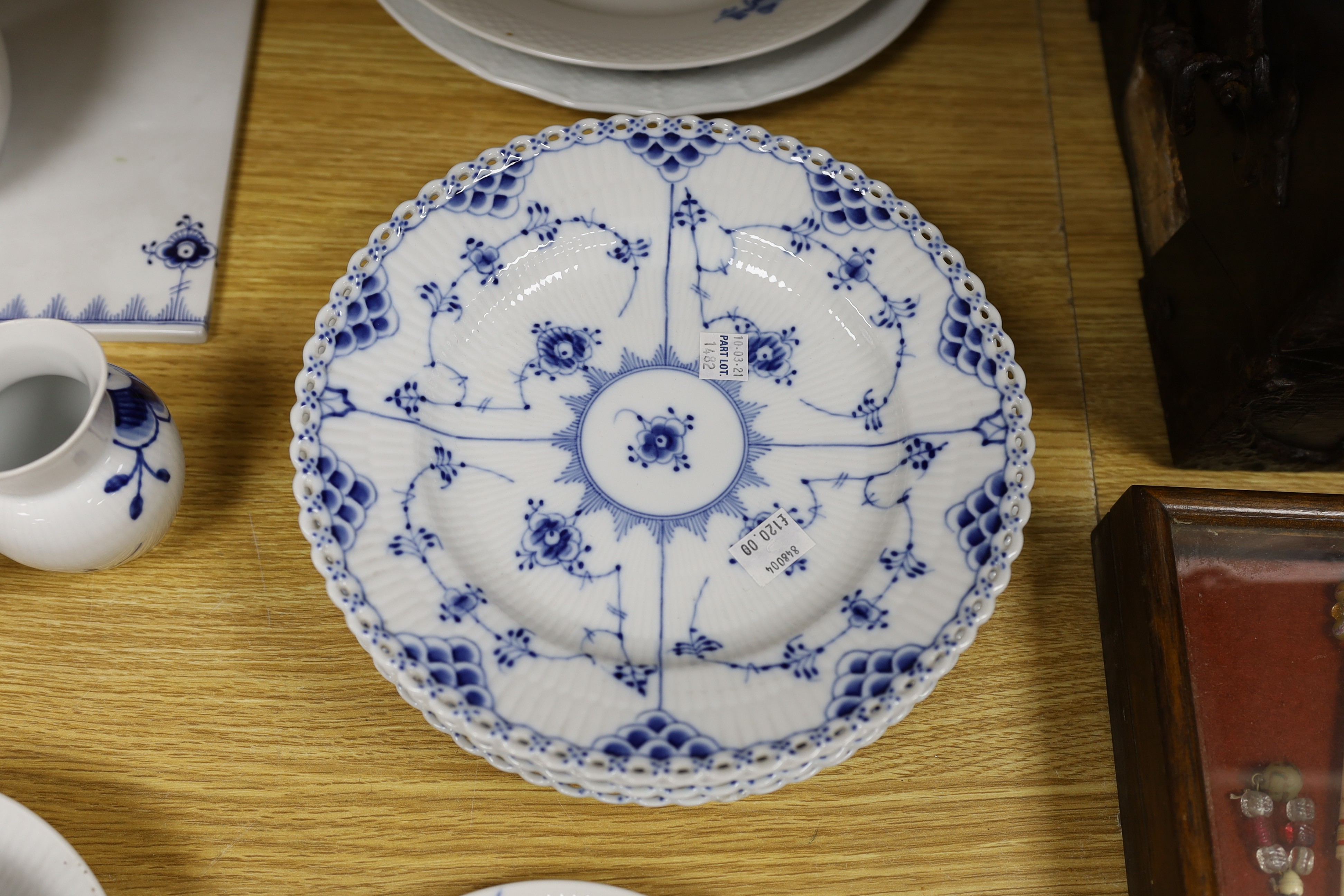 A collection of varying patterns of Royal Copenhagen blue and white tableware